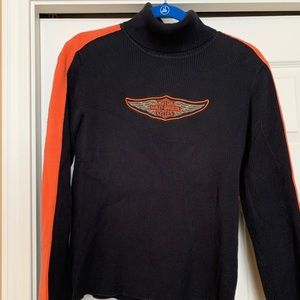 Woman’s Harley Davidson turtleneck.